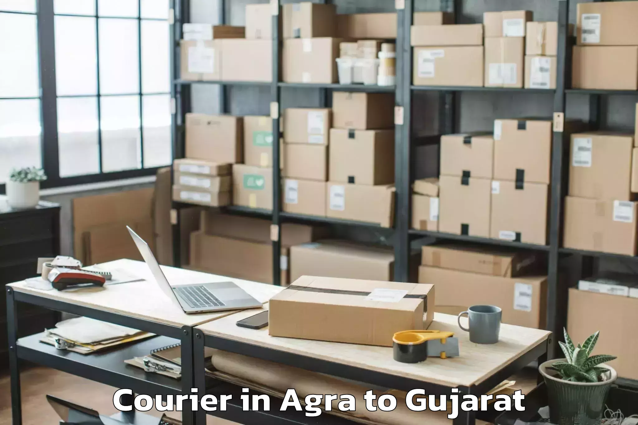 Get Agra to Tilakvada Courier